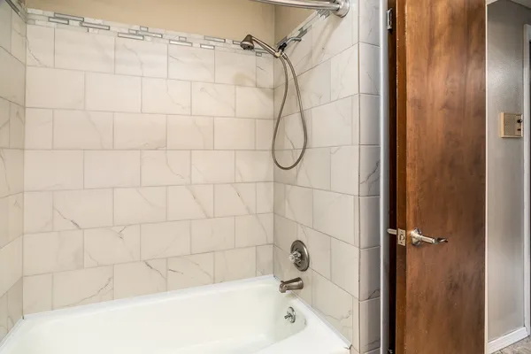 a bathroom with a bathtub