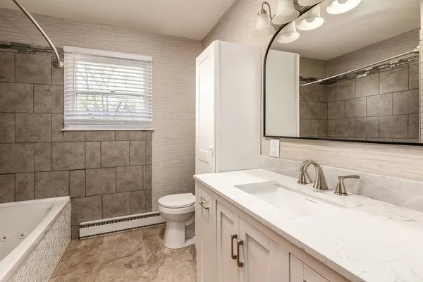 a bathroom with a bathtub