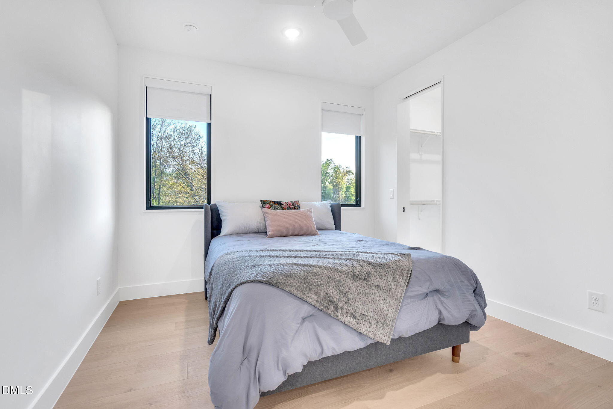 810 Culpepper Lane Raleigh, NC 27610 - Photo 25 of 31 a bedroom with a bed and window