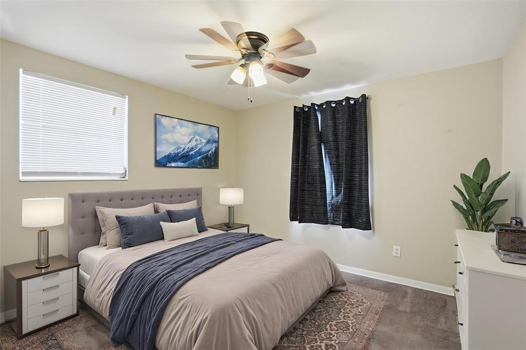 9543 Century Drive Spring Hill, FL 34608 - Photo 14 of 25 a bedroom with a bed and a window