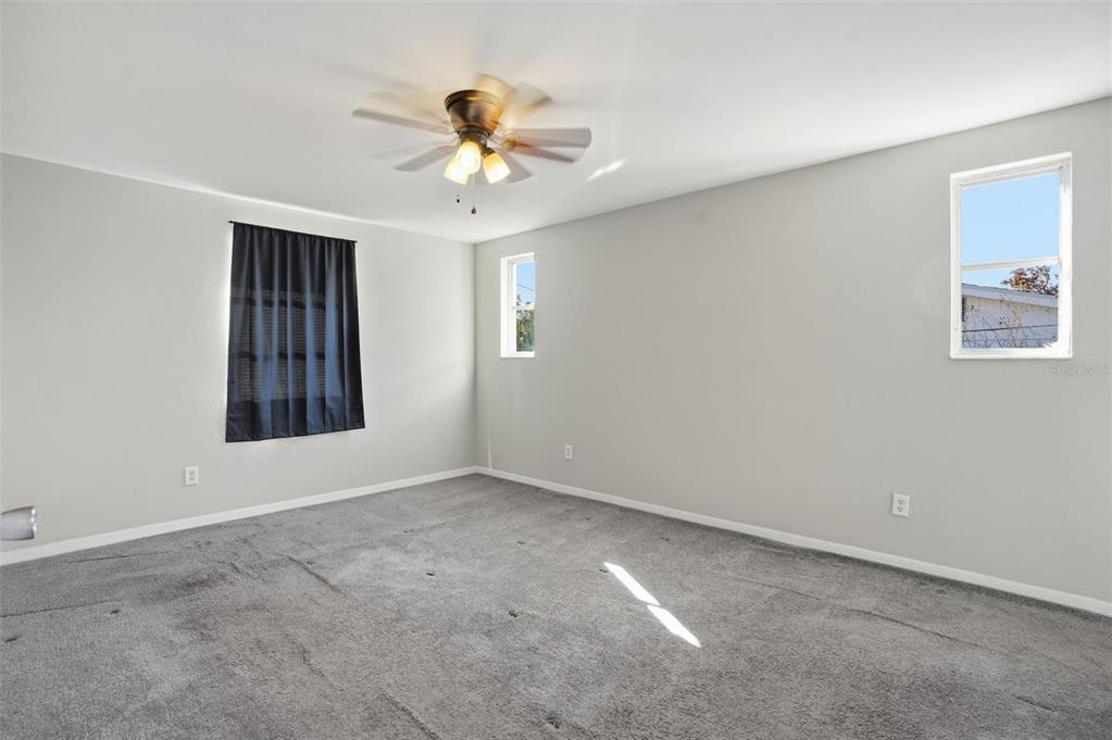 9543 Century Drive Spring Hill, FL 34608 - Photo 16 of 25 a view of an empty room with a window
