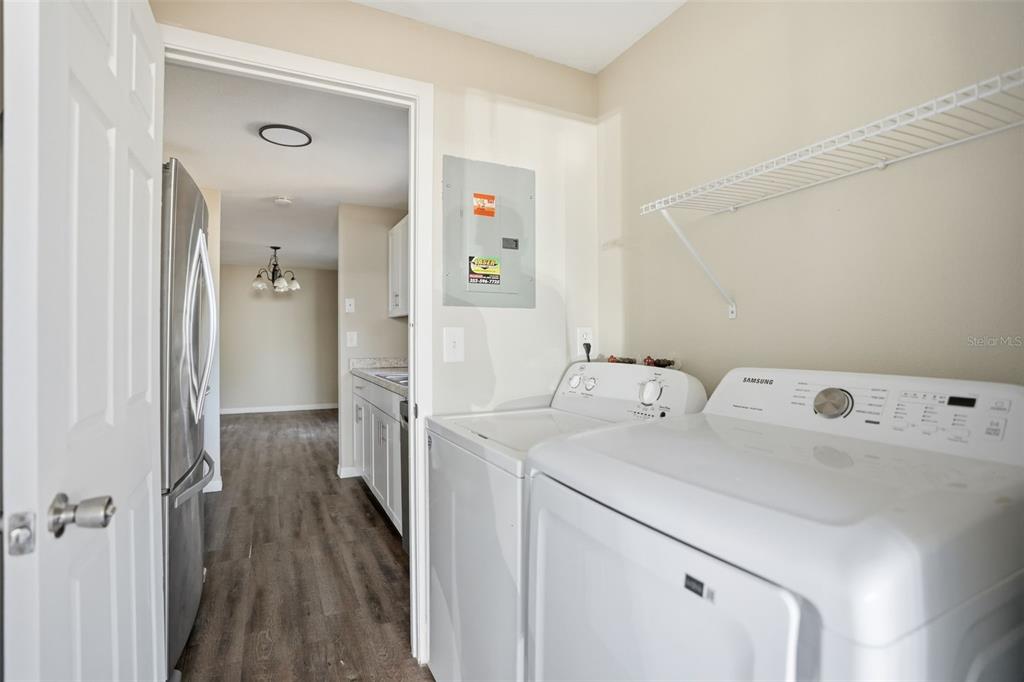 9543 Century Drive Spring Hill, FL 34608 - Photo 21 of 25 a utility room with dryer and washer