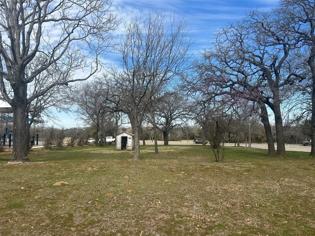 601 West Highway 199 Springtown, TX 76082 - Photo 10 of 10 a view of a tree in a yard