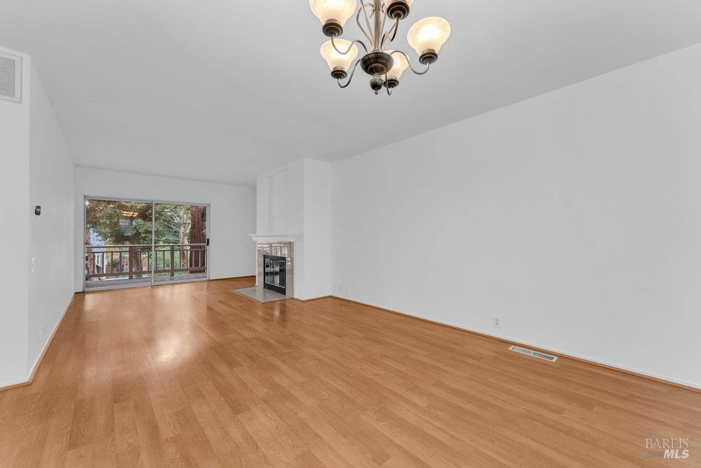 135 Koch Road Corte Madera, CA 94925 - Photo 12 of 57 a view of an empty room with a window