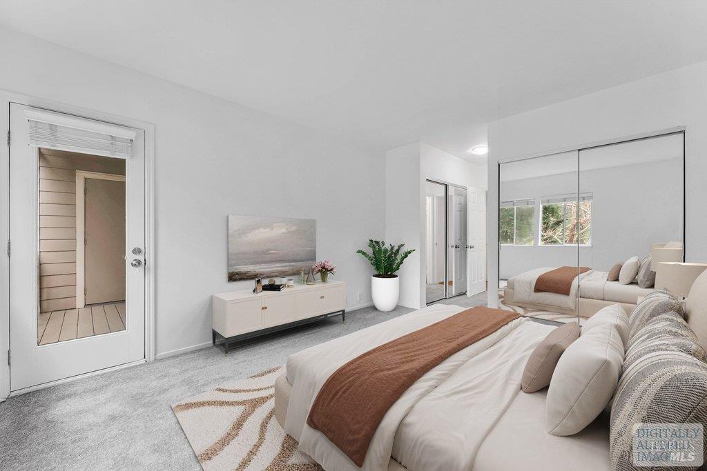 135 Koch Road Corte Madera, CA 94925 - Photo 24 of 57 a bedroom with a bed and large window