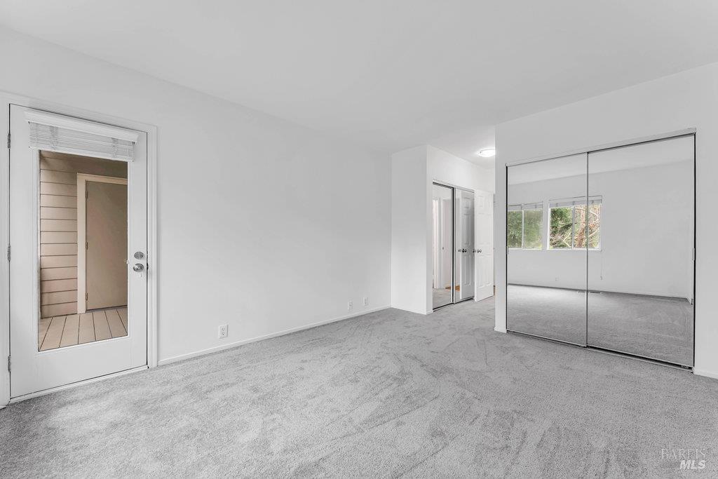 135 Koch Road Corte Madera, CA 94925 - Photo 25 of 57 a view of an empty room with closet and a bathroom