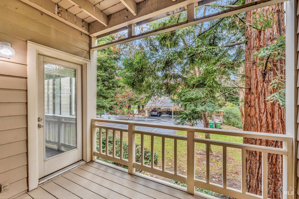 135 Koch Road Corte Madera, CA 94925 - Photo 28 of 57 a view of a balcony with wooden floor