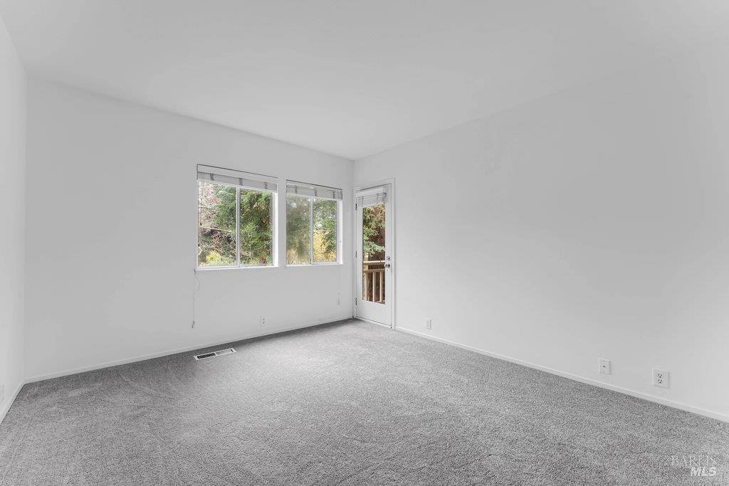135 Koch Road Corte Madera, CA 94925 - Photo 31 of 57 an empty room with windows