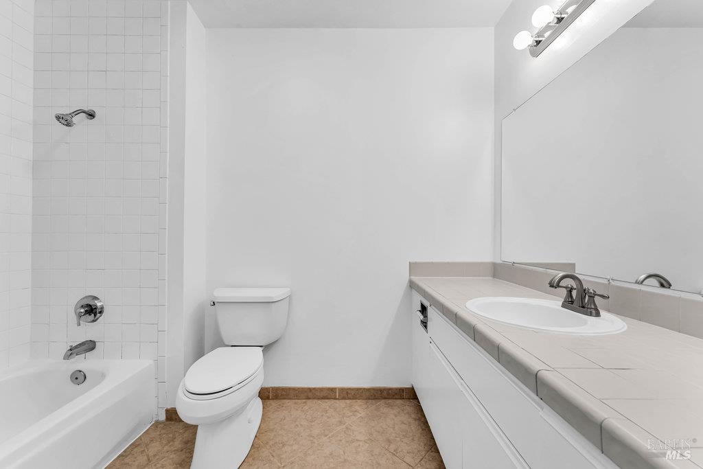 135 Koch Road Corte Madera, CA 94925 - Photo 36 of 57 a bathroom with a sink a toilet and shower
