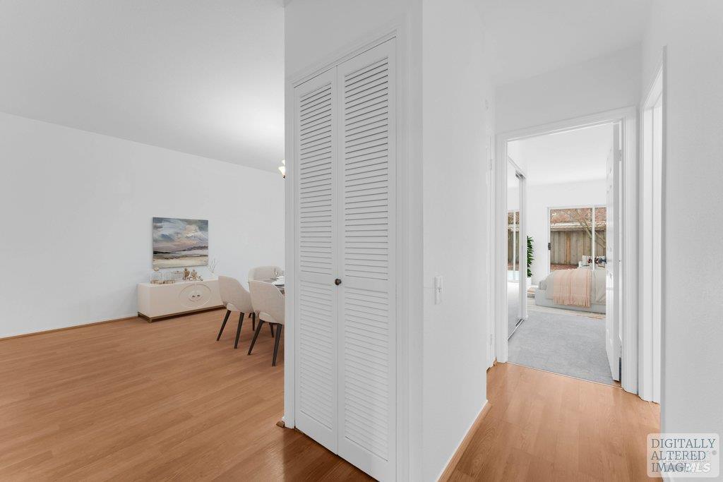 135 Koch Road Corte Madera, CA 94925 - Photo 37 of 57 a view of a hallway with wooden floor and furniture