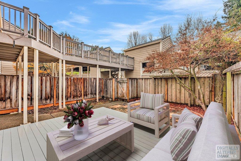 135 Koch Road Corte Madera, CA 94925 - Photo 41 of 57 a view of a patio with couches table and chairs and wooden floor