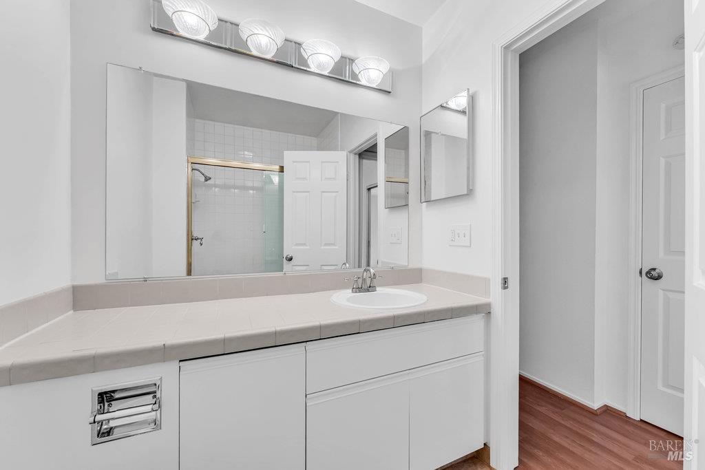 135 Koch Road Corte Madera, CA 94925 - Photo 49 of 57 a bathroom with a sink and a mirror
