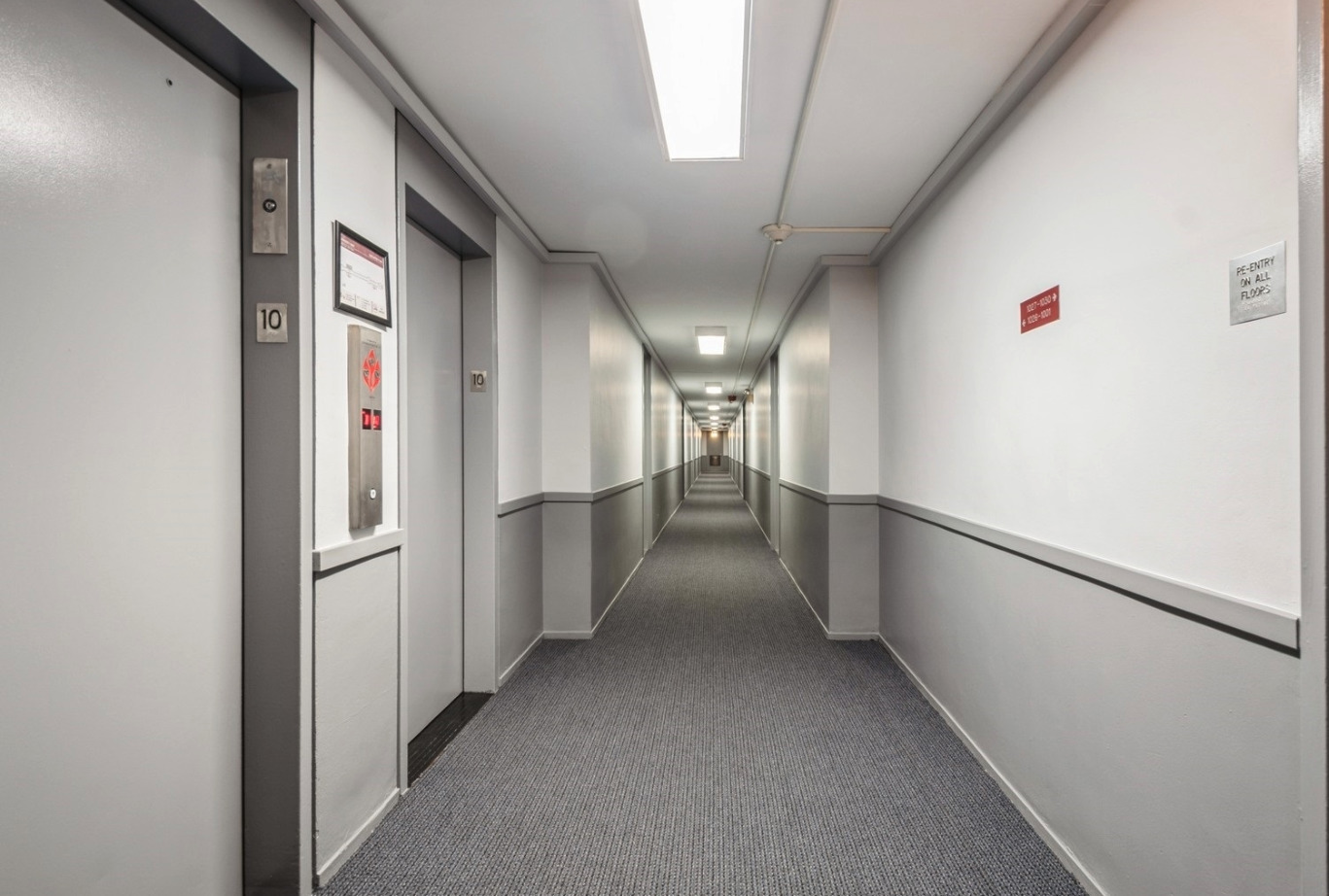 1451 East 55th Street, Unit 1030N Chicago, IL 60615 - Photo 2 of 18 a view of hallway with stairs