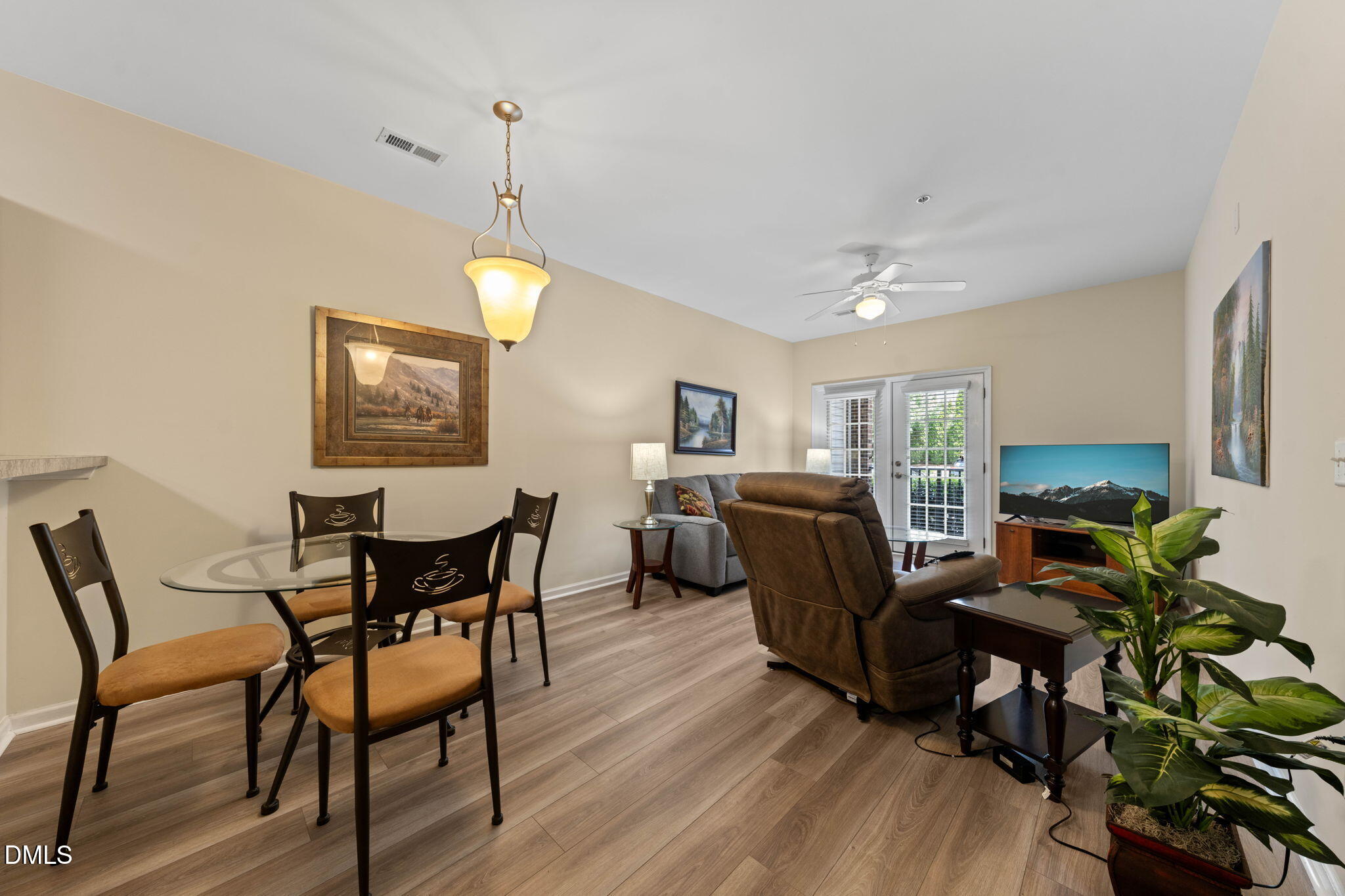2610 Oldgate Drive, Unit 108 Raleigh, NC 27604 - Photo 7 of 41 Dining-living room
