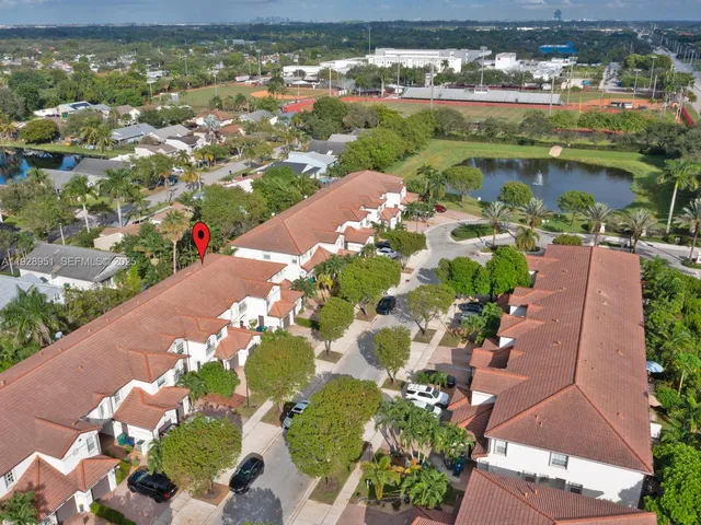 a workspace with furniture and a window
