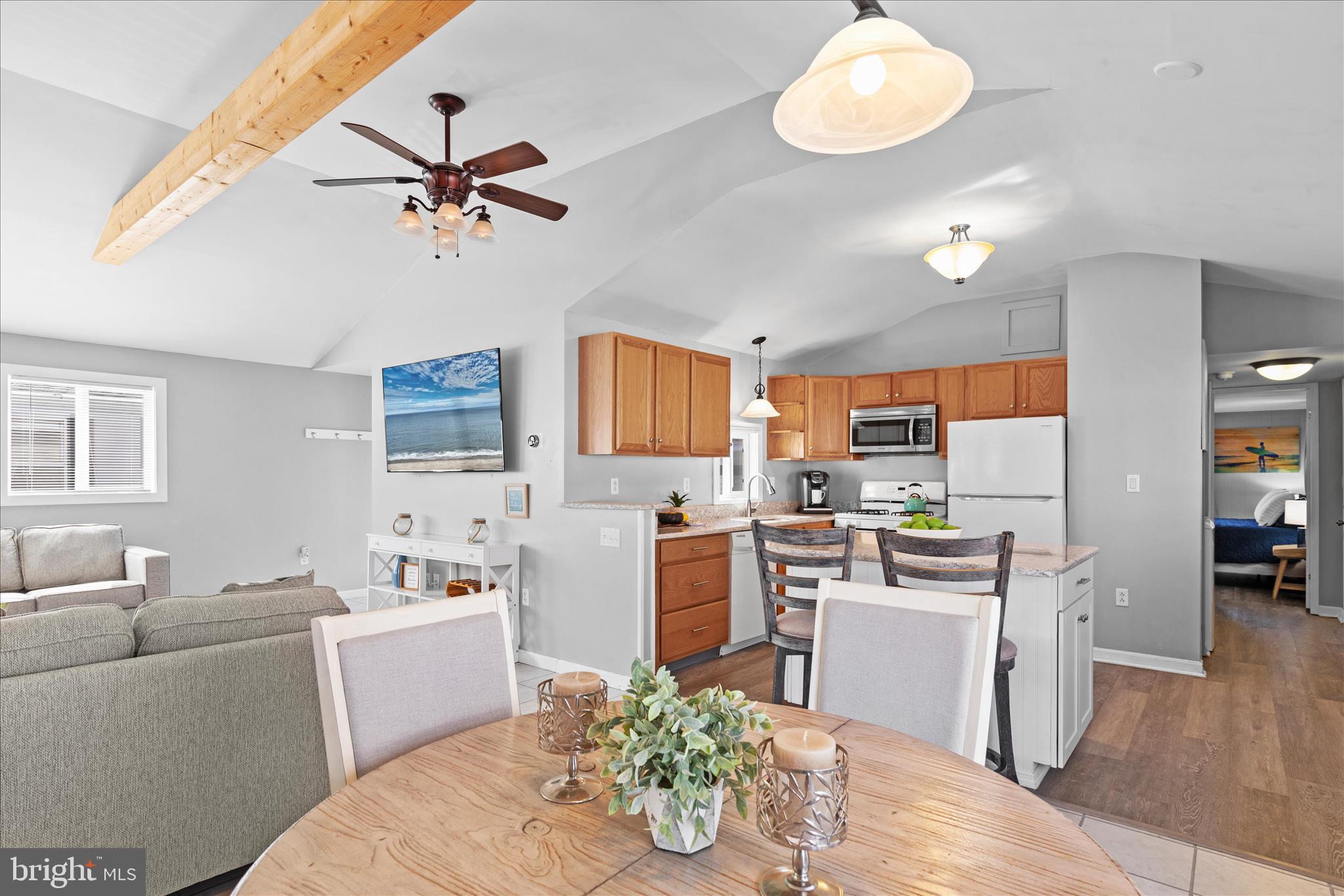 25760 Blue Ridge Street Millsboro, DE 19966 - Photo 11 of 64 a kitchen with a sink counter top space appliances and cabinets
