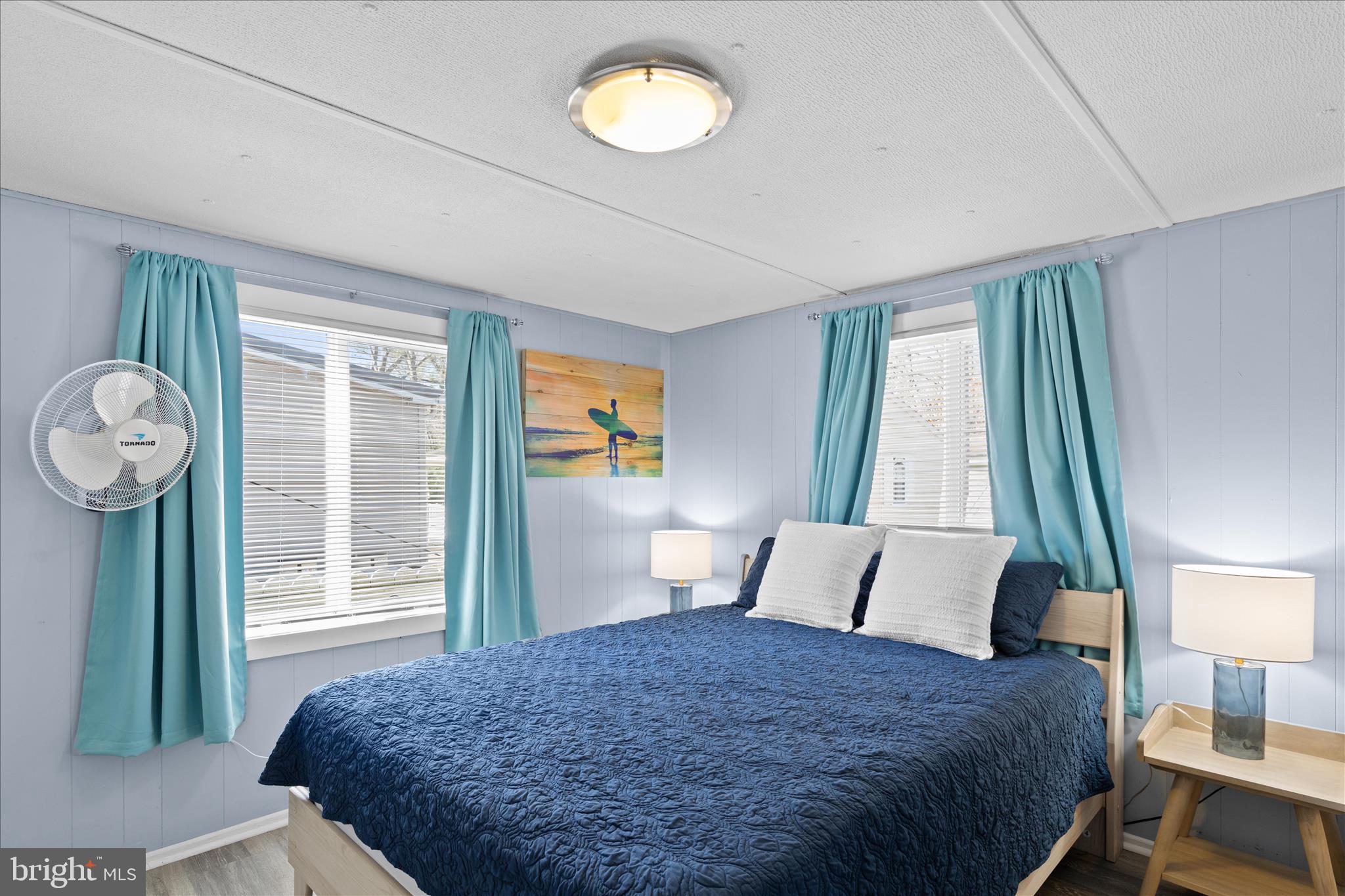 25760 Blue Ridge Street Millsboro, DE 19966 - Photo 25 of 64 a bedroom with a bed and a window