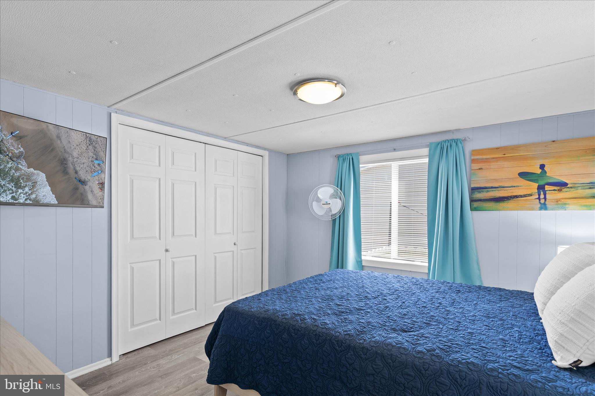 25760 Blue Ridge Street Millsboro, DE 19966 - Photo 26 of 64 a bedroom with a bed and a dresser