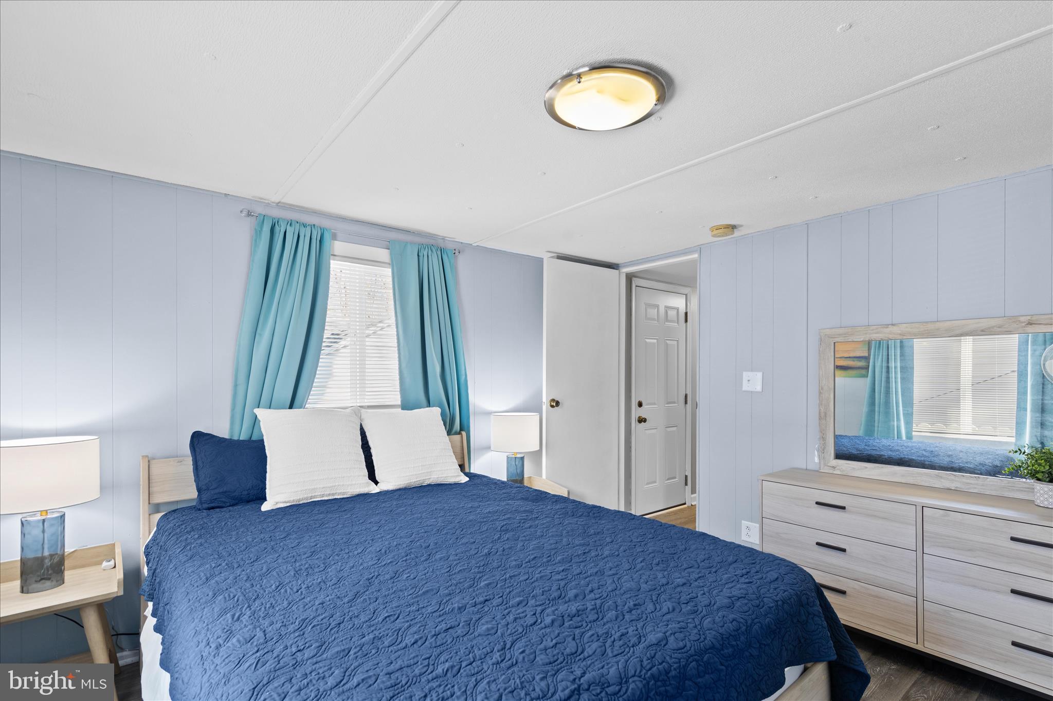 25760 Blue Ridge Street Millsboro, DE 19966 - Photo 27 of 64 a bedroom with a bed and window