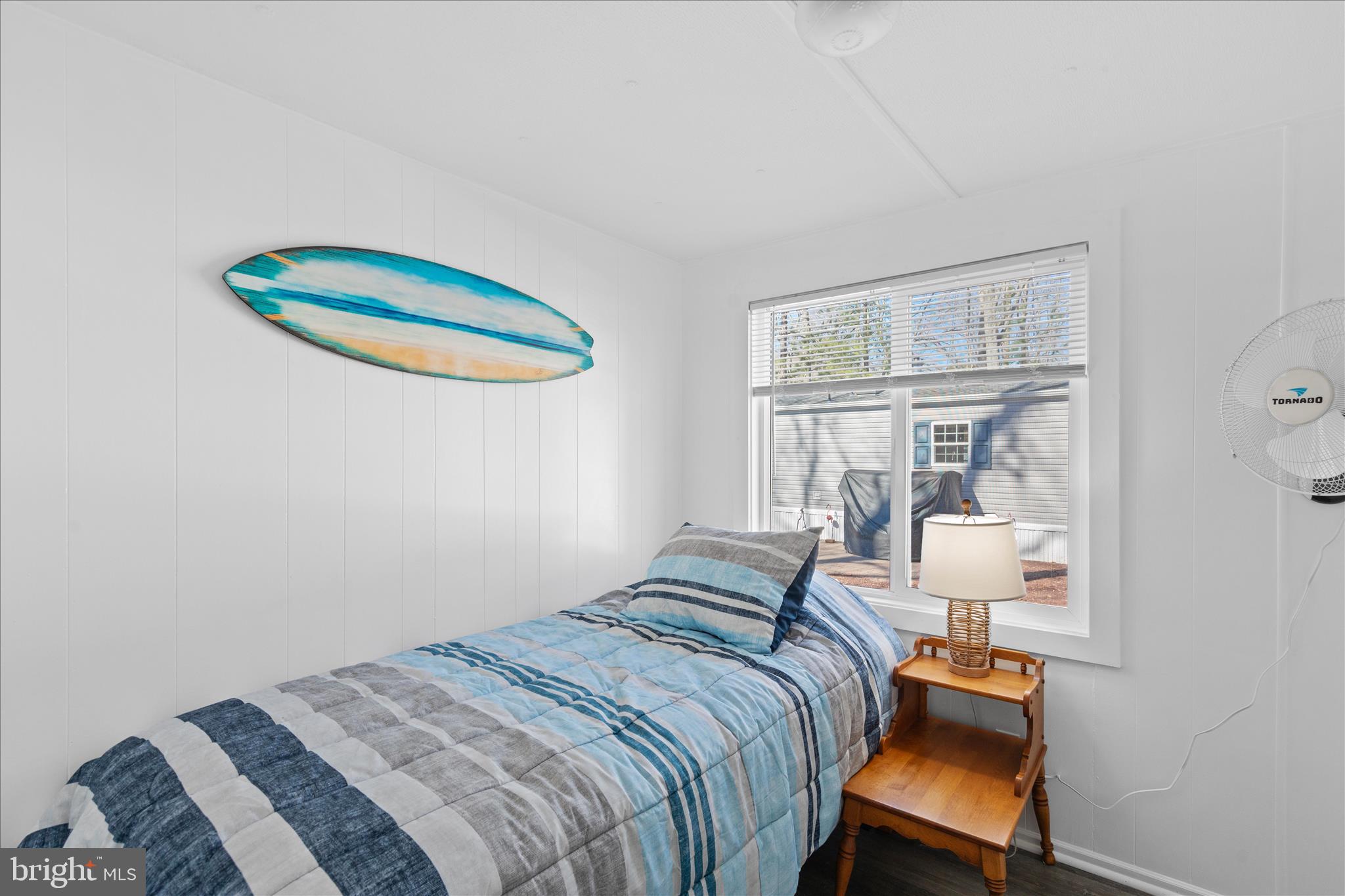 25760 Blue Ridge Street Millsboro, DE 19966 - Photo 36 of 64 a bedroom with a bed and a window