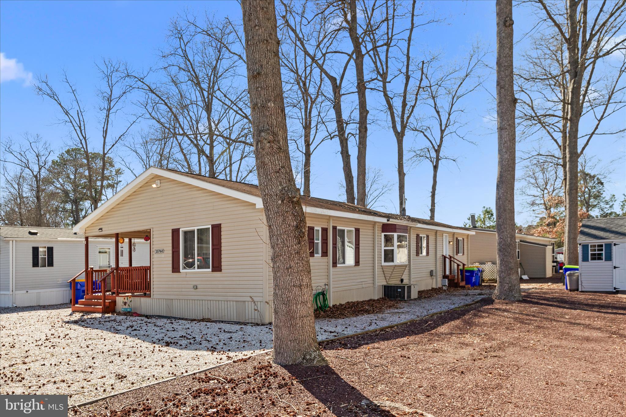 25760 Blue Ridge Street Millsboro, DE 19966 - Photo 49 of 64 a front view of a house with a yard