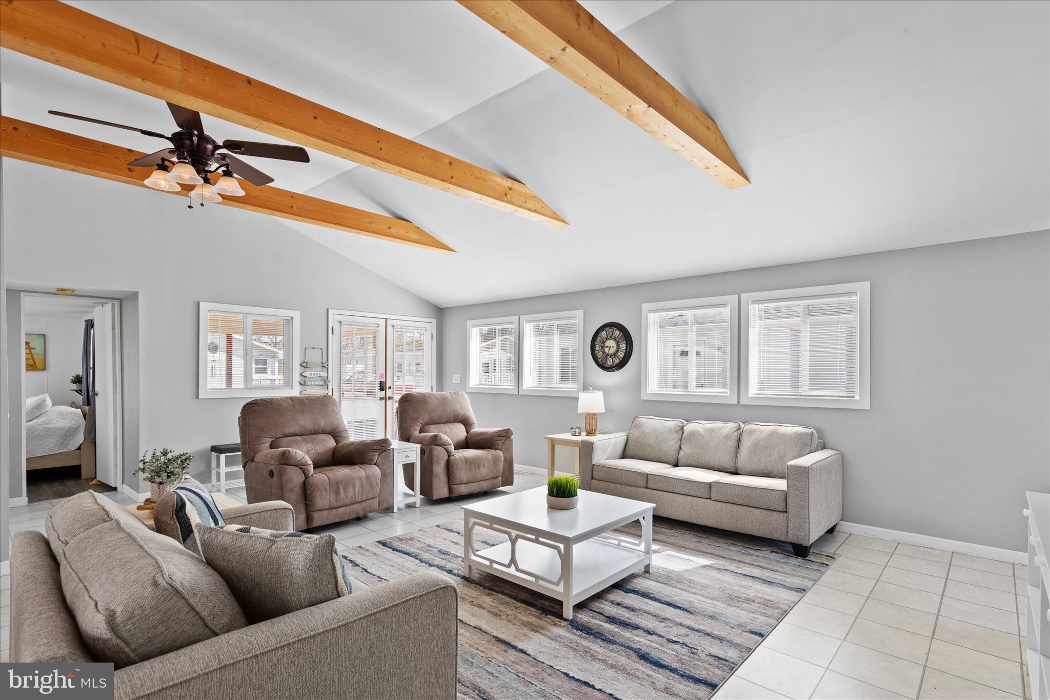 25760 Blue Ridge Street Millsboro, DE 19966 - Photo 5 of 64 a living room with furniture and a large window