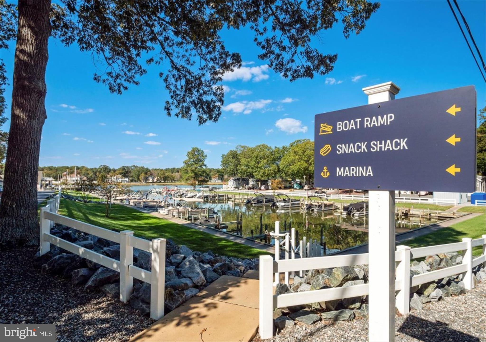 25760 Blue Ridge Street Millsboro, DE 19966 - Photo 58 of 64 a view of a street with a sign board