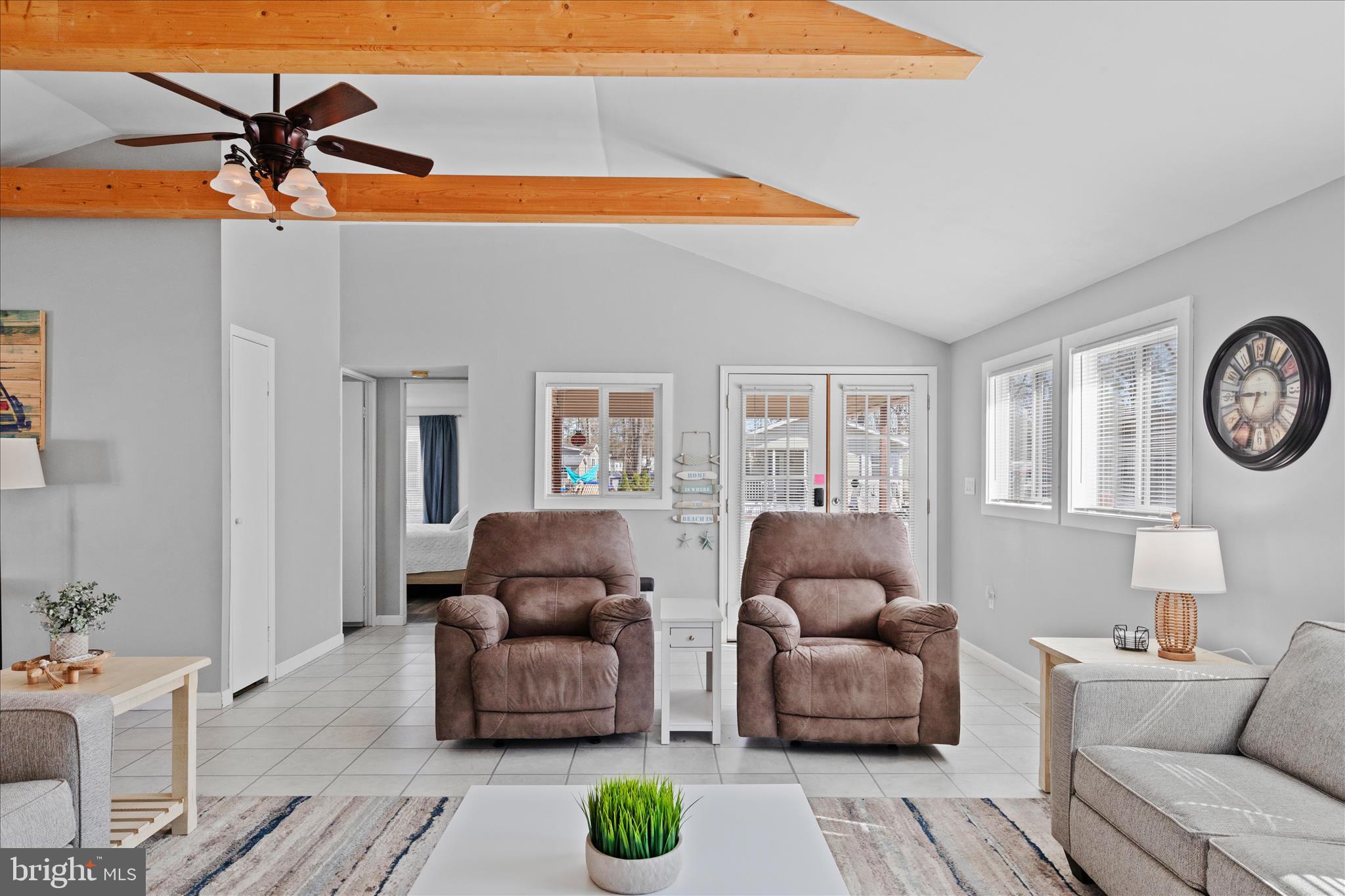 25760 Blue Ridge Street Millsboro, DE 19966 - Photo 6 of 64 a living room with furniture and a large window