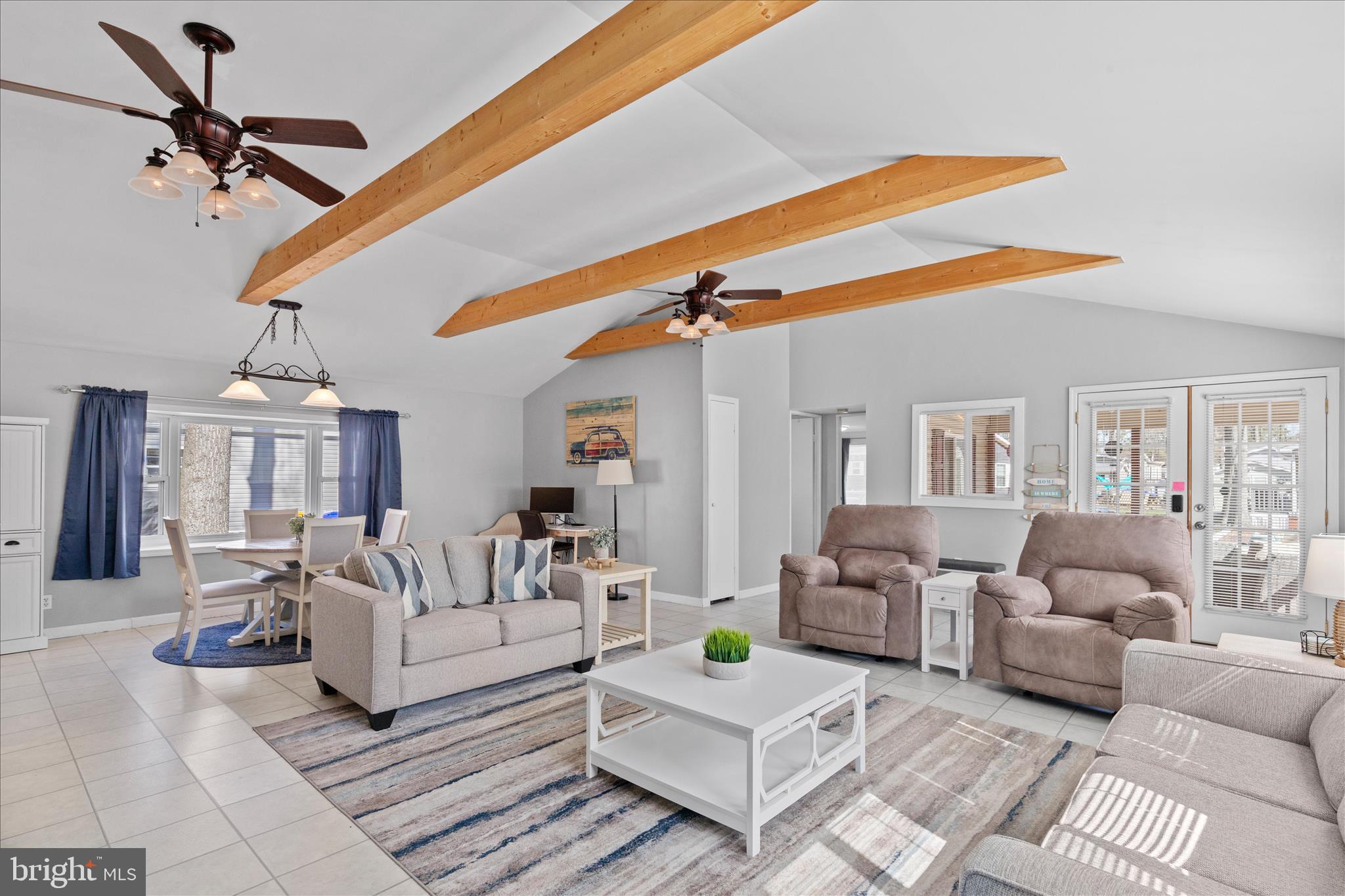 25760 Blue Ridge Street Millsboro, DE 19966 - Photo 7 of 64 a living room with furniture and a ceiling fan