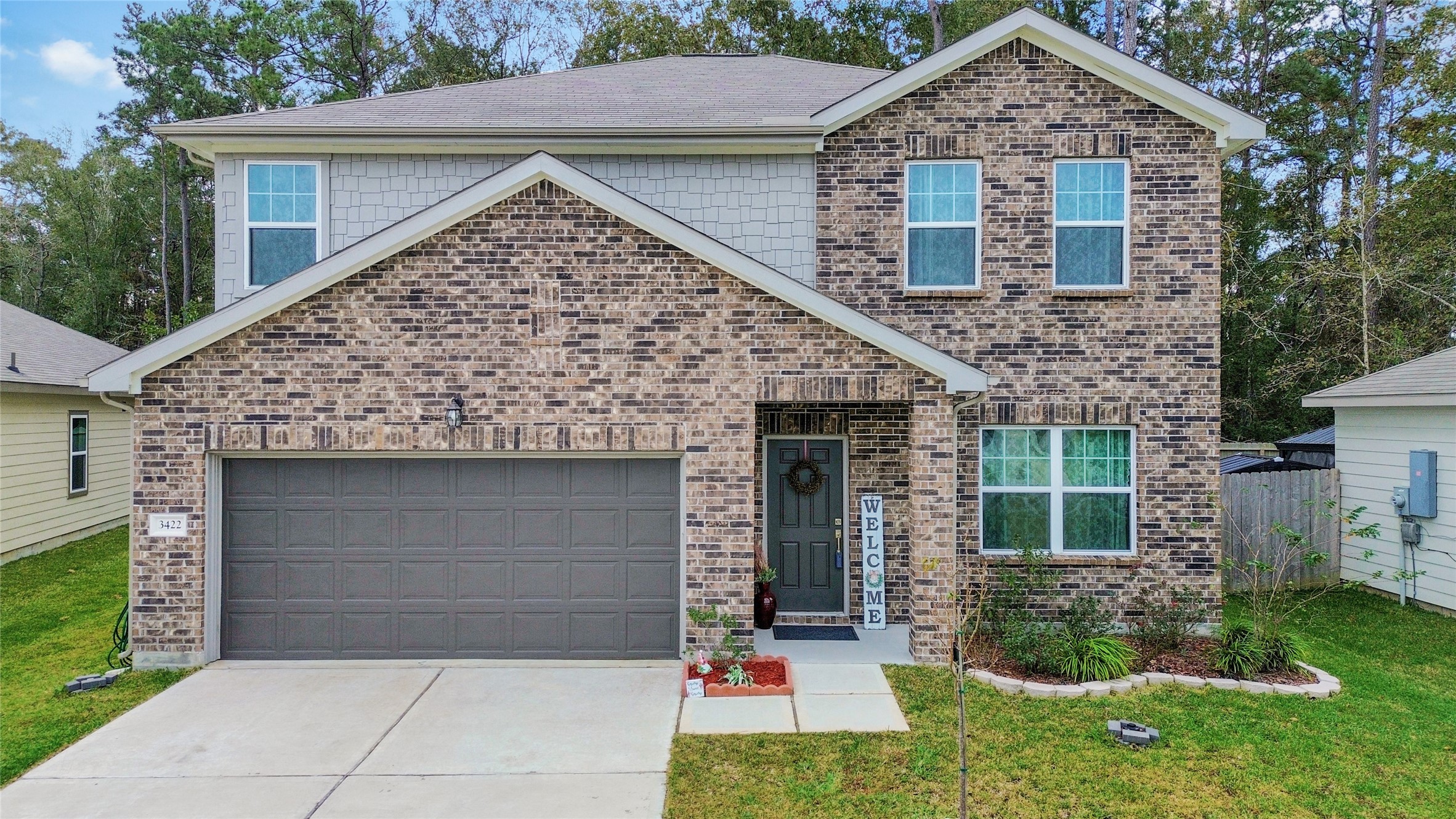 Welcome to a home that offers fresh landscaping, but also a blank canvas.