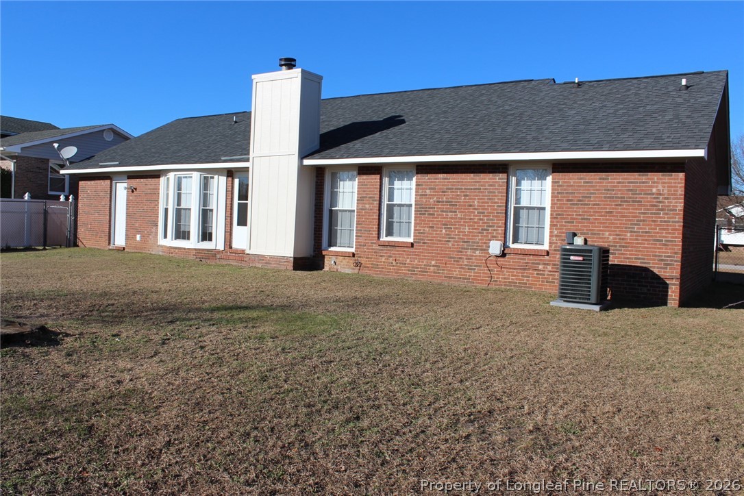 7805 Gallant Ridge Drive Fayetteville, NC 28314 - Photo 24 of 25 a front view of a house with a yard
