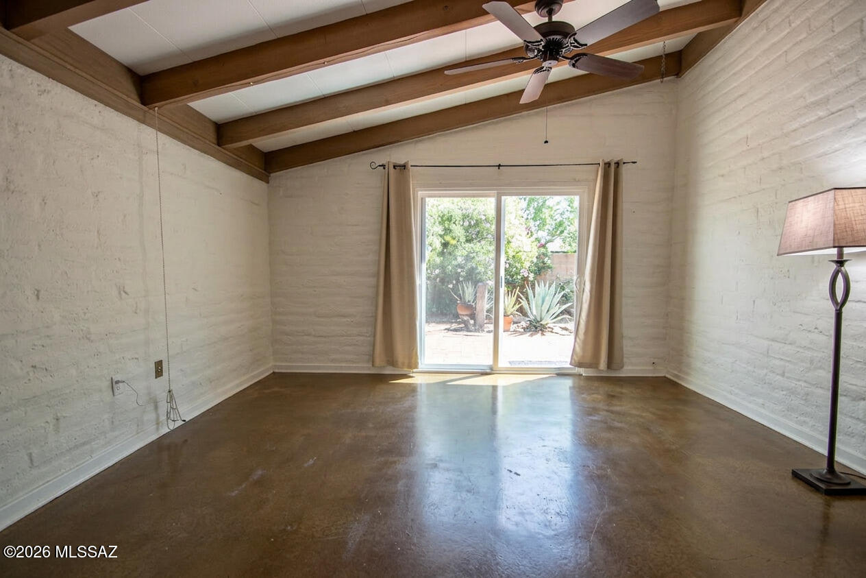 4130 East River Road Tucson, AZ 85718 - Photo 13 of 46 a view of an empty room with a window