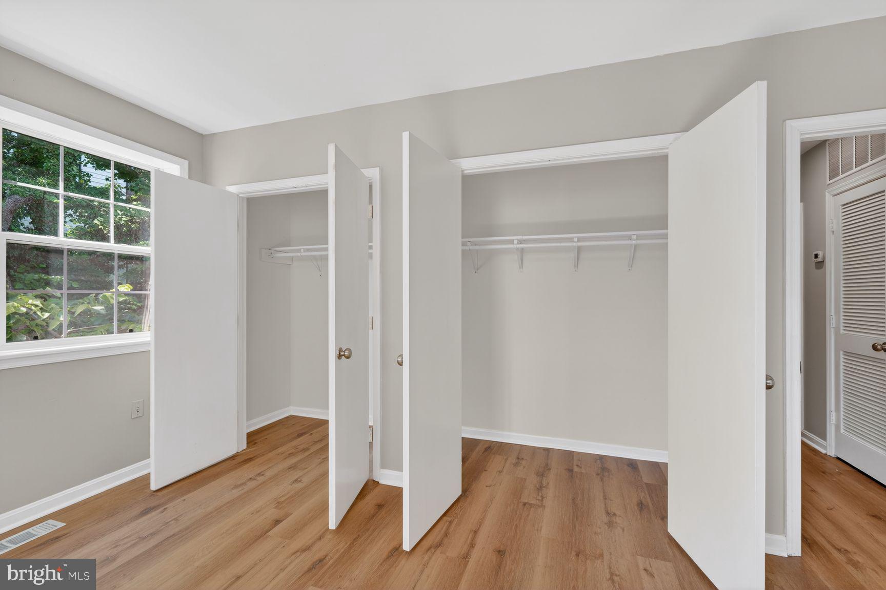 1008 Rittenhouse Street Northwest, Unit 15 Washington, DC 20011 - Photo 27 of 39 a view of empty room with wooden floor and window