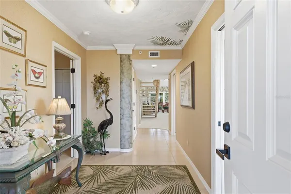 a view of a dining room with furniture water and kitchen view