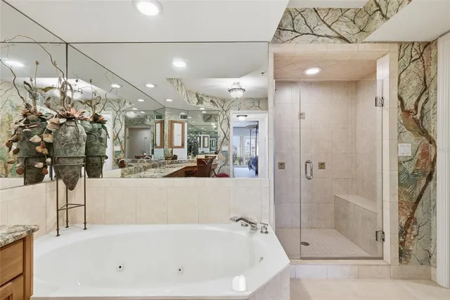 a bedroom with furniture and book shelf