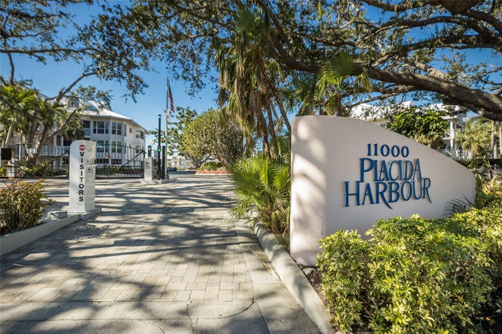 11000 Placida Road, Unit 1504 Placida, FL 33946 - Photo 38 of 73 a sign board with yard