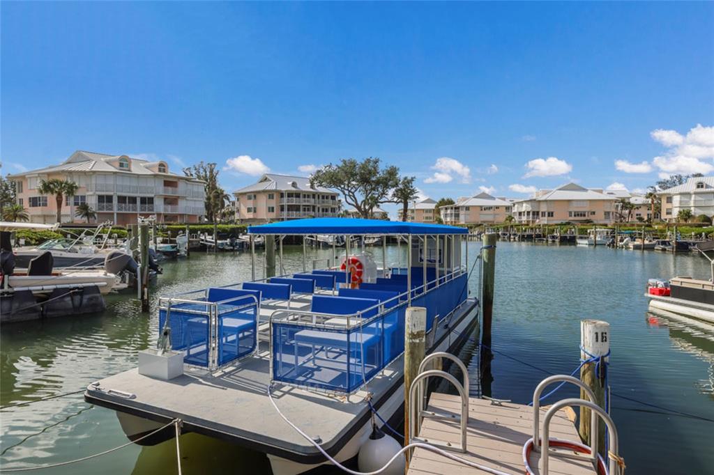 11000 Placida Road, Unit 1504 Placida, FL 33946 - Photo 55 of 73 a view of a chairs and table on the terrace