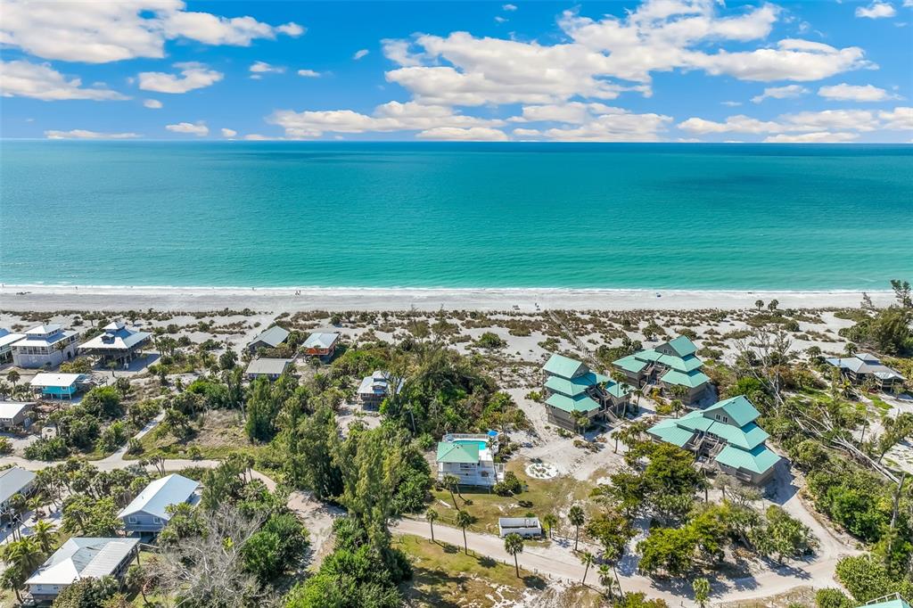 11000 Placida Road, Unit 1504 Placida, FL 33946 - Photo 61 of 73 a view of a yard with an outdoor space