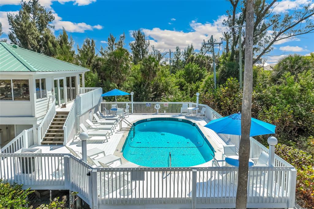 11000 Placida Road, Unit 1504 Placida, FL 33946 - Photo 64 of 73 a view of a chair and tables in the balcony