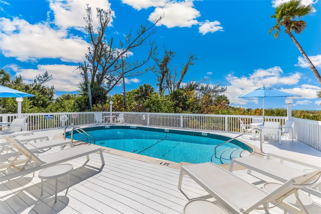 11000 Placida Road, Unit 1504 Placida, FL 33946 - Photo 66 of 73 a view of a terrace with chairs