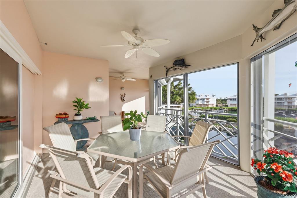 11000 Placida Road, Unit 1504 Placida, FL 33946 - Photo 7 of 73 a view of a dining room with furniture window and outside view