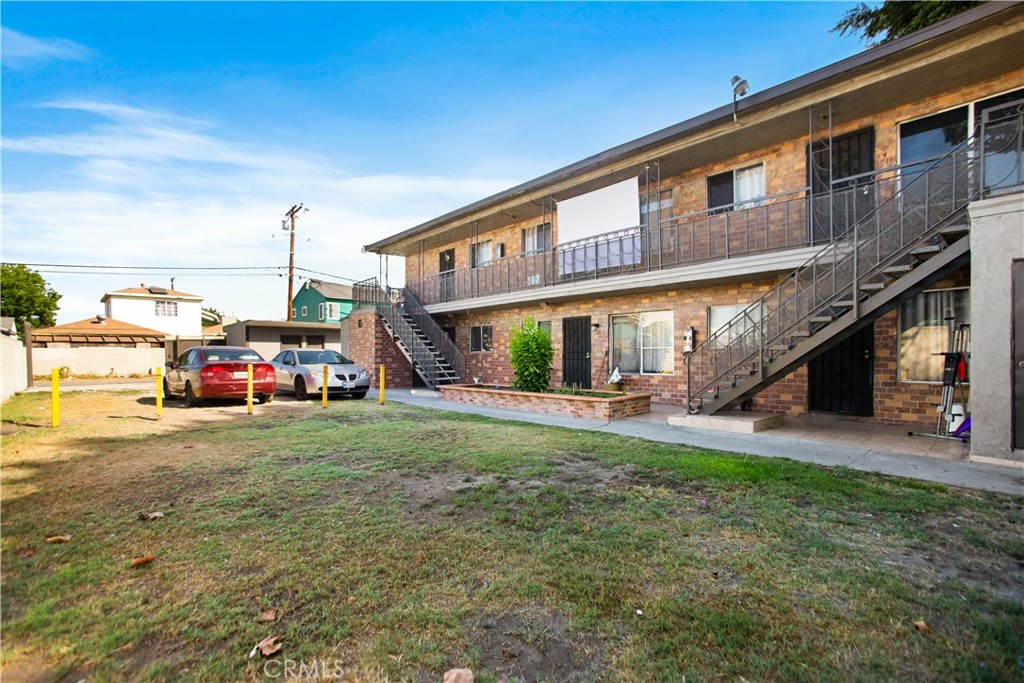 4623 East Compton Boulevard Compton, CA 90221 - Photo 1 of 1 a view of an house with backyard and porch