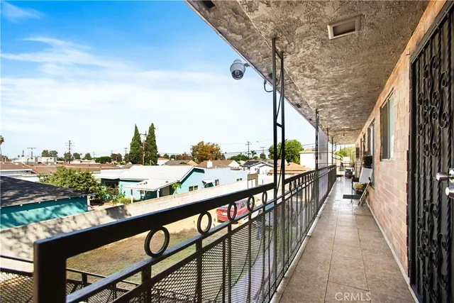 a view of a balcony with city view