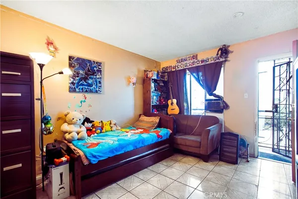 a room with toys and stairs