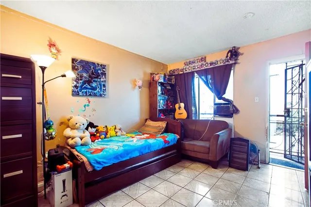 a room with toys and stairs