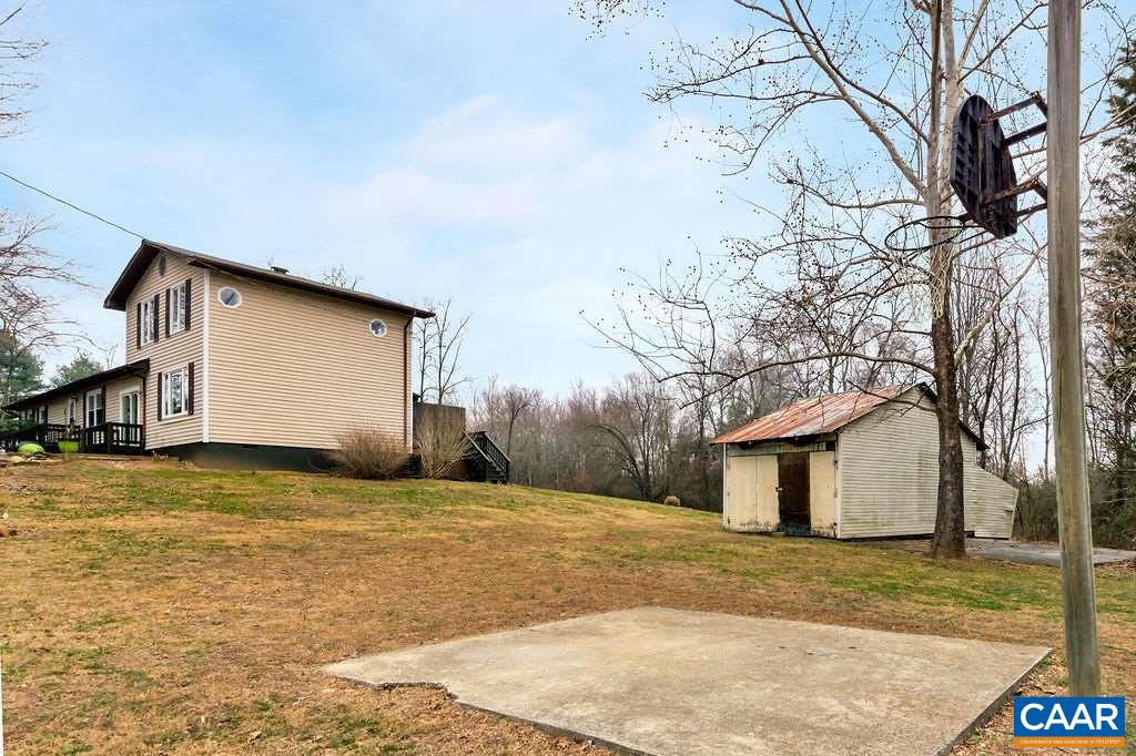 165 Rippin Run Road Ruckersville, VA 22968 - Photo 44 of 50 a view of a backyard of the house