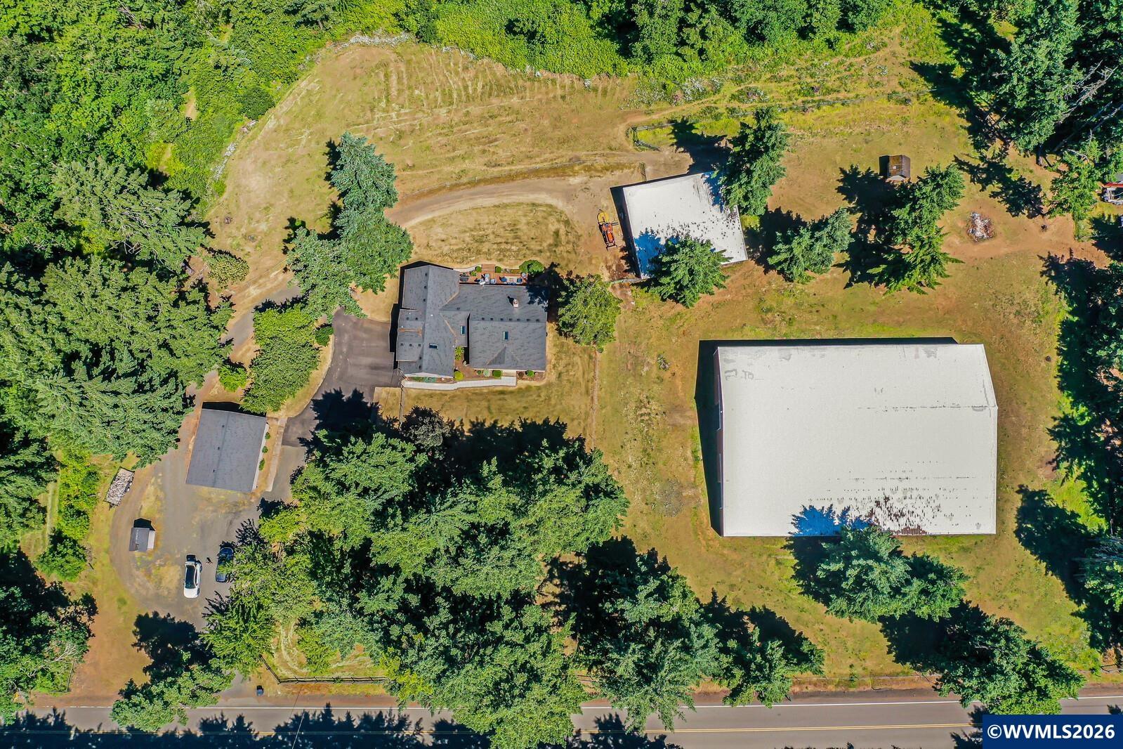 1110 Reuben Boise Road Dallas, OR 97338 - Photo 2 of 49 an aerial view of a house with outdoor space
