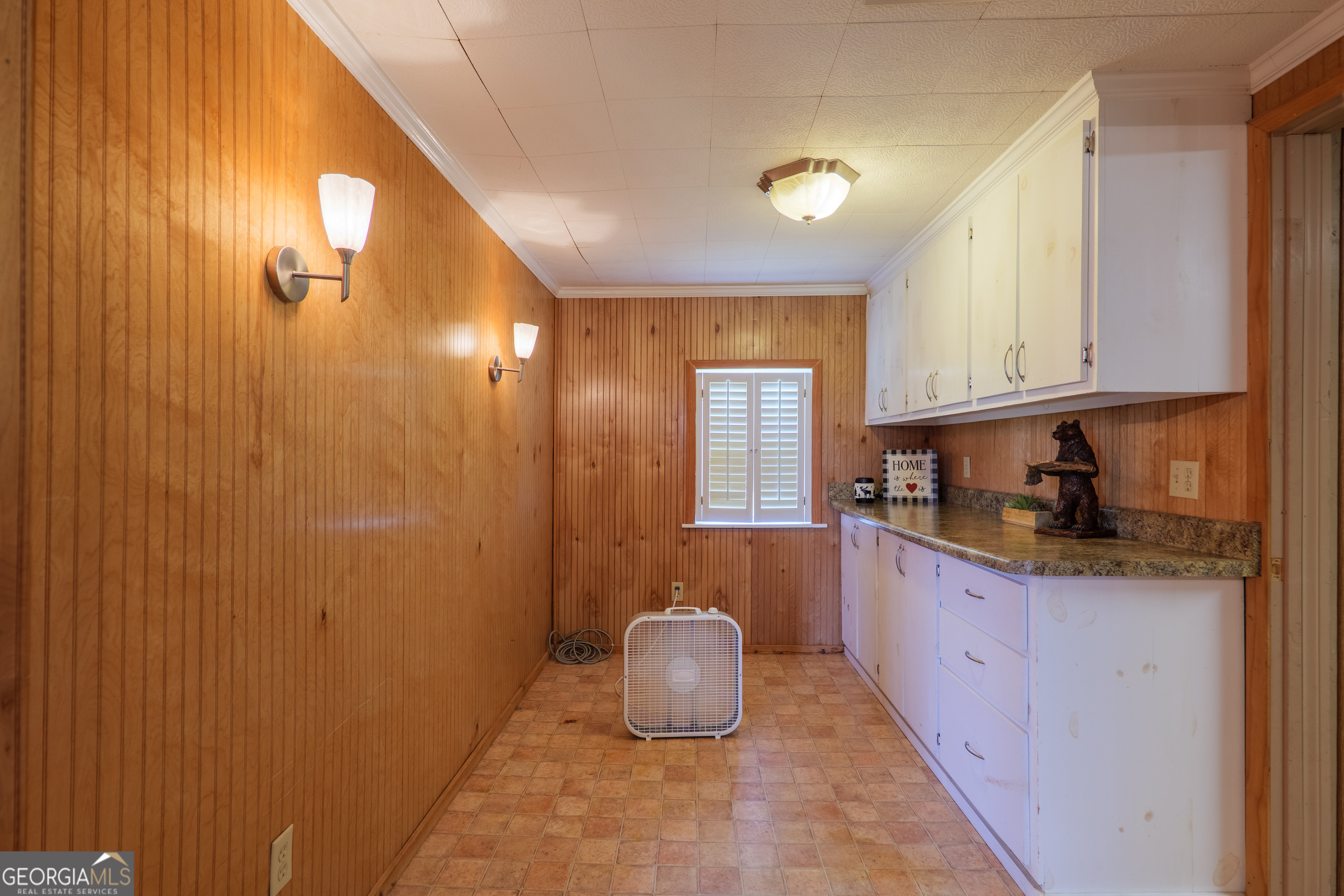 106 Nancy Avenue Fargo, GA 31631 - Photo 20 of 41 a kitchen with granite countertop a sink cabinets and window