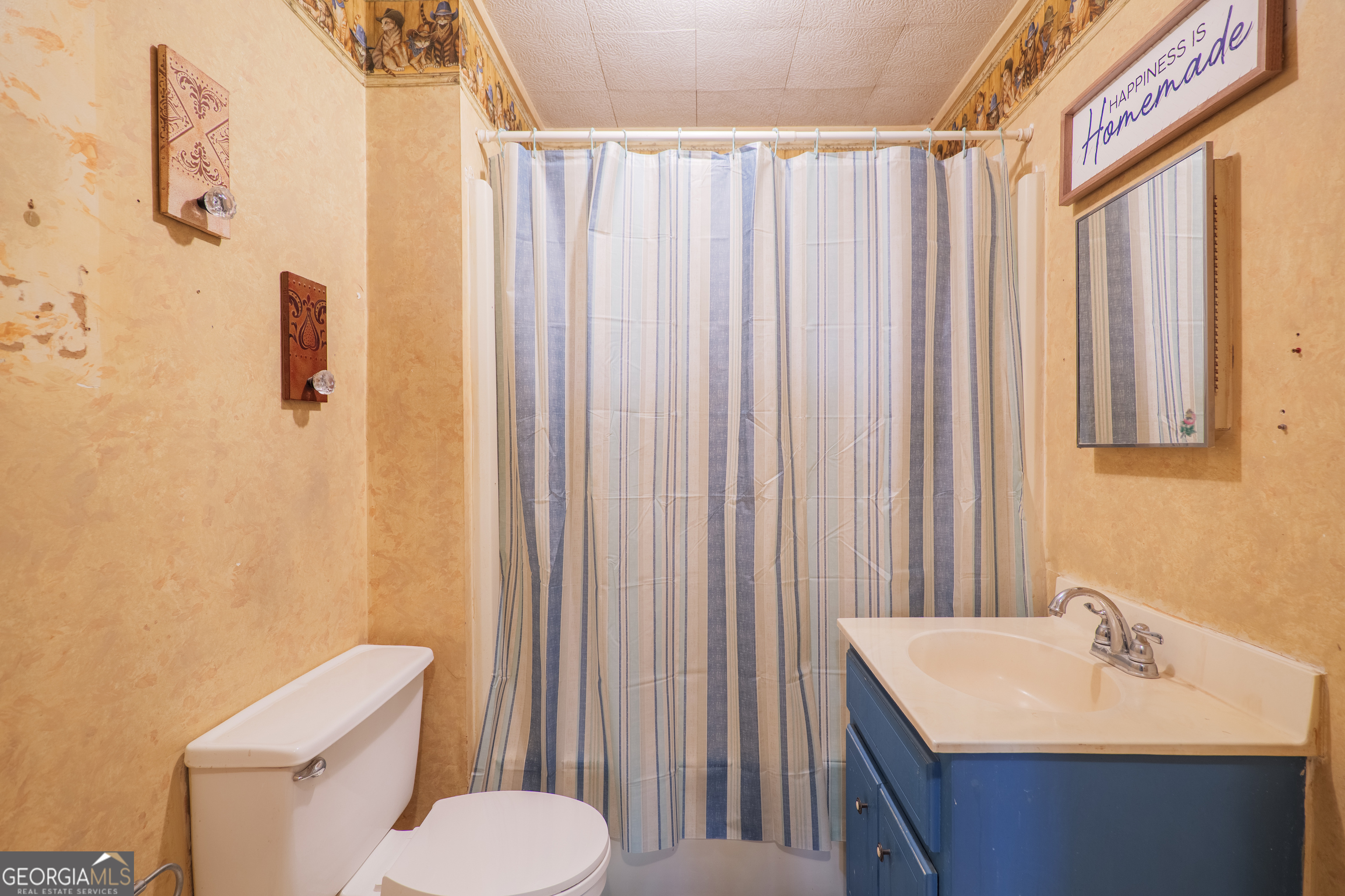 106 Nancy Avenue Fargo, GA 31631 - Photo 27 of 41 a bathroom with a sink toilet and shower