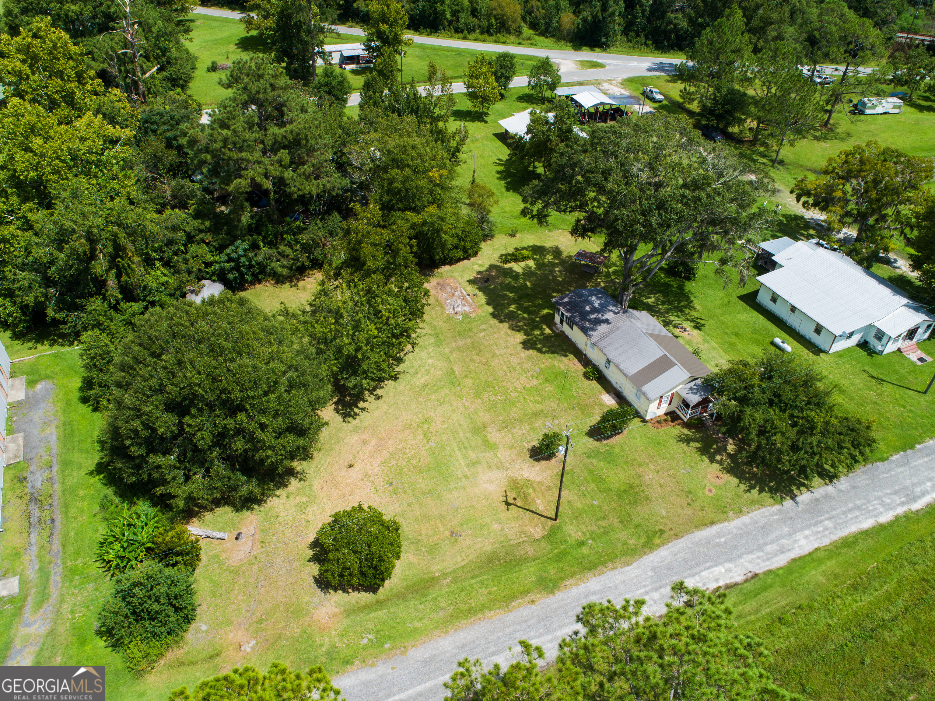 106 Nancy Avenue Fargo, GA 31631 - Photo 4 of 41 an aerial view of residential houses with outdoor space